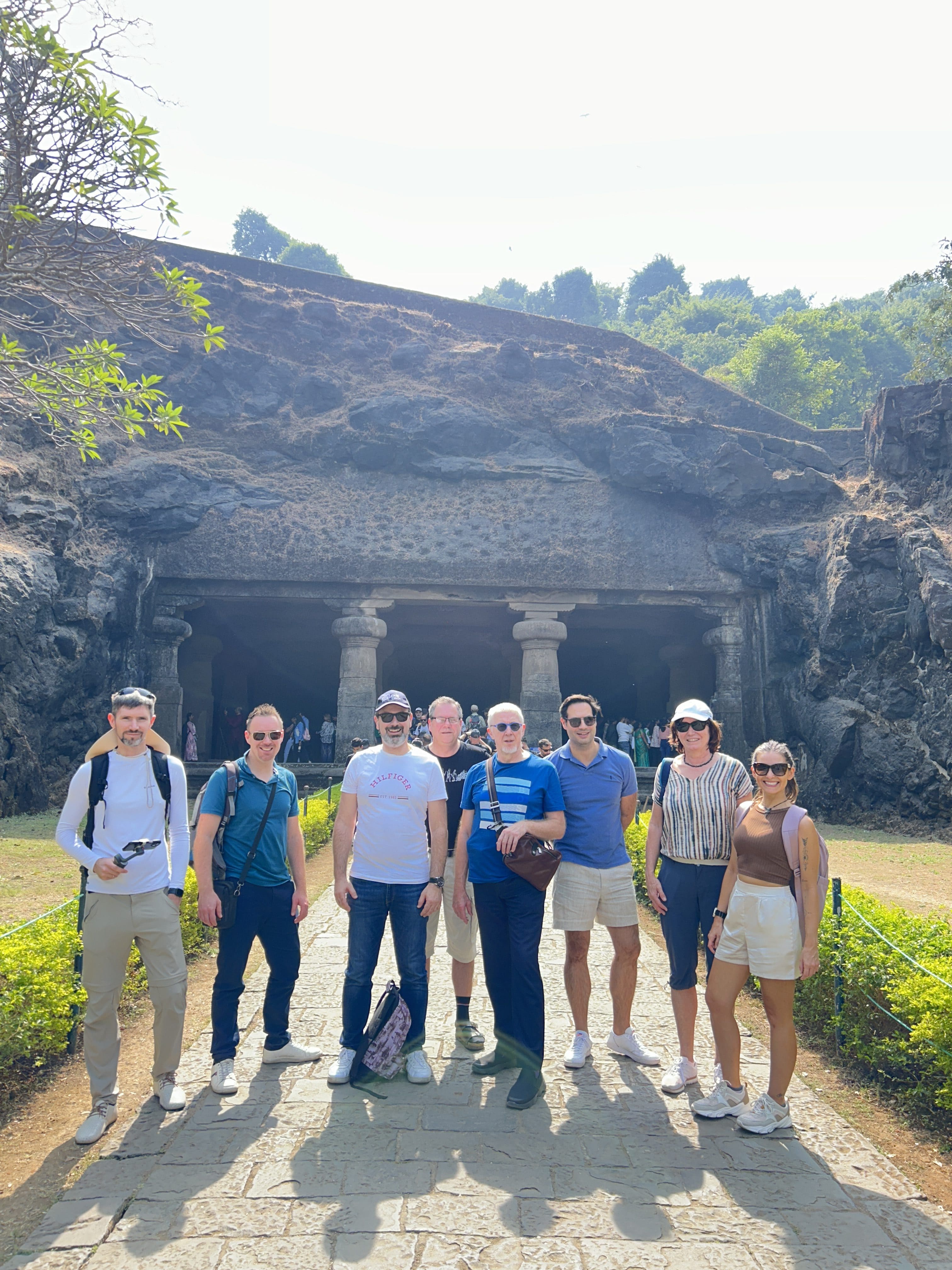 International tourists on Elephanta Caves tour by speedboat in Mumbai India