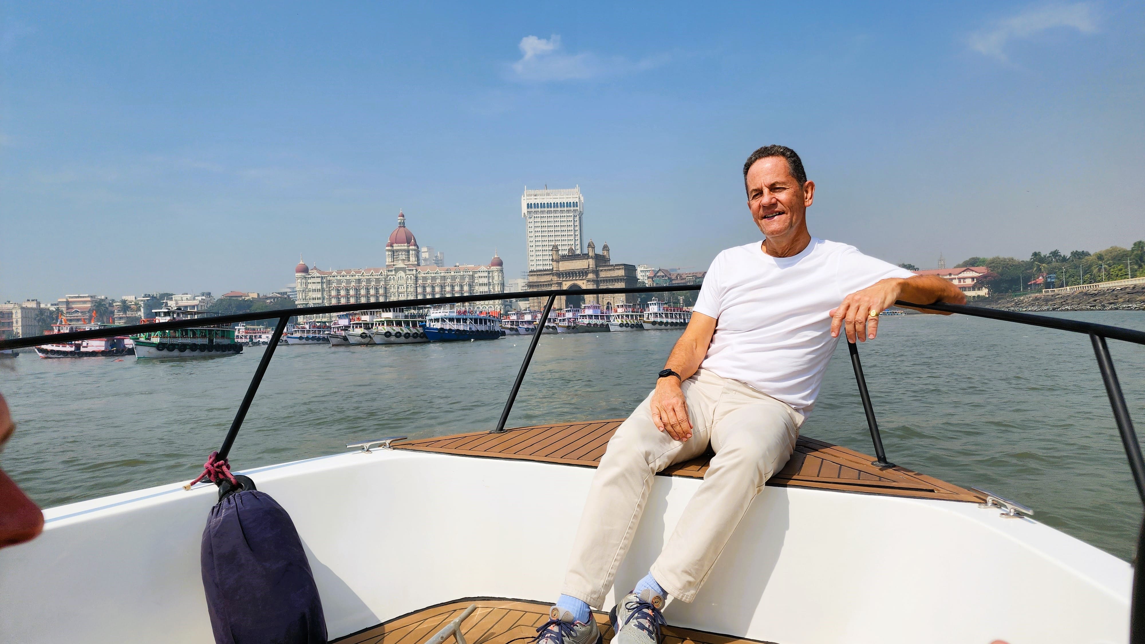 Solo foreign traveler on Elephanta Caves tour by speedboat in Mumbai harbor